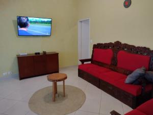 Casa de frente para o mar, pé na areia.