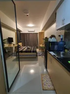 Cozy Condo Studio with Balcony Amenities View at SM North Edsa - Marilao