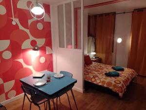 Appartements The Seventies Appart retro (proche gare et centre ville) : photos des chambres