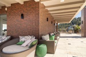 Porto Madero 202 – Apartamento Moderno em Condomínio com Piscina e Academia no Rooftop no Centro de Bombinhas.