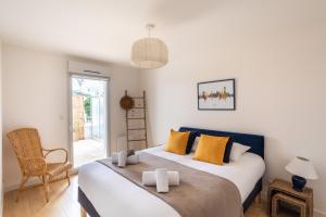 Appartements Le Jardin d'Ulysse - 2 chambres avec parking : photos des chambres