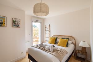 Appartements Le Jardin d'Ulysse - 2 chambres avec parking : photos des chambres