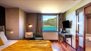 Hotels Les Tresoms Lake and Spa Resort : photos des chambres