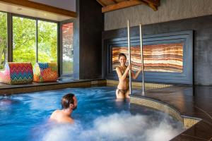 Hotels Les Tresoms Lake and Spa Resort : photos des chambres