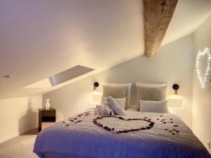 Appartements Cocon Blanc calin - Jacuzzi privatif - Love Room a Saint Etienne : photos des chambres