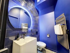 Appartements Cocon Blanc calin - Jacuzzi privatif - Love Room a Saint Etienne : photos des chambres