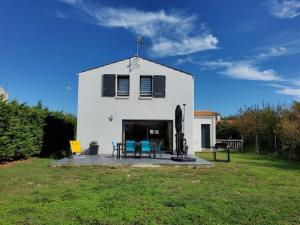 Maisons de vacances Maison Chaleureuse et moderne sur l’ile lumineuse : photos des chambres