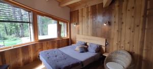 Lodges Bulle de Bois, ecolodge insolite avec spa privatif au milieu des volcans - Bulles d'Herbe : photos des chambres