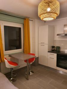 Appartements CocooningSpace tout equipe + parking prive : photos des chambres