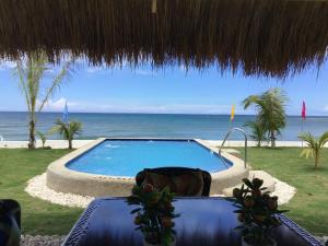BambooBeachVilla2 AC NEW OCEANFRONT POOL sunsetview garden kitchen SATELLITE STARLINK WI-FI