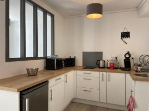 LOasis Marin meublé, lumineux et cosy à 1min à pied du marché dans lhyper centre de La Rochelle avec TV et Wifi