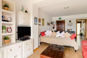 Casa de Las Flores - Apartamento con jardín privado frente a la Playa de Comillas