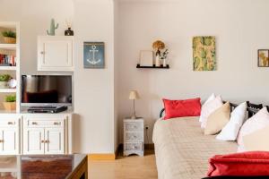 Casa de Las Flores - Apartamento con jardín privado frente a la Playa de Comillas