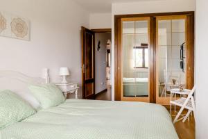 Casa de Las Flores - Apartamento con jardín privado frente a la Playa de Comillas