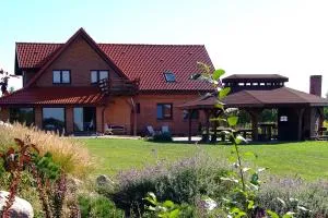 Mazury całoroczny dom nad jeziorem do wynajęcia z własną linią brzegową - Pasym