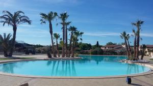 Villas Agreable Maison, DOMAINE TAMARIS, 4 pieces 5 couchages, Wifi, sejour climatise, Acces payant pour les piscines- PORTIRAGNES PLAGE LRTAMJ21 : photos des chambres