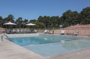 Appart'hotels Domaine du Ferret Restaurant & Spa : photos des chambres