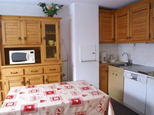 2 pièces au pied des pistes, 6 couchages - FR-1-557-35