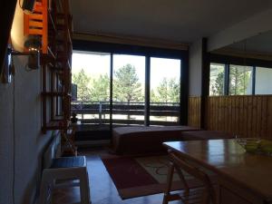 Studio cosy 4 personnes au pied des pistes avec parking et casier à skis - FR-1-602-49