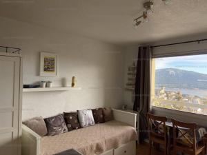 Studio cabine cosy avec balcon Sud, parking et WiFi aux Angles - FR-1-295-131