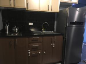 Cozy Condo Near NAIA with WIFI, Pool and Balcony