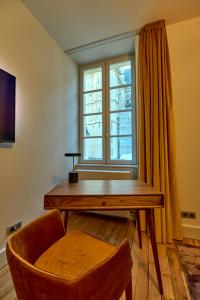 Appartements Appartement Montagnon - les suites du palais - Classe 4 etoiles, parking prive, vue cathedrale, 3 chambres, PRIMO C0NCIERGERIE : photos des chambres