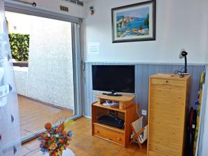 Appartement rez-de-jardin avec piscine et parking à Marseillan-Plage - FR-1-387-63