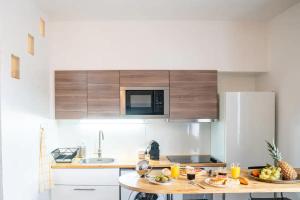 Appartements appartement n2 centre village, clim, parking gratuit : photos des chambres