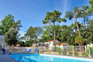 Maisons de vacances Villa 4 pers. avec piscine commune proche mer : photos des chambres