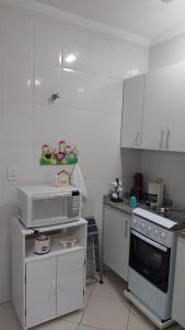 Casa aconchegante com ar condicionado para família em condomínio