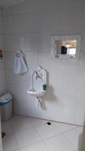 Casa aconchegante com ar condicionado para família em condomínio