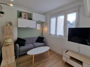 Appartements Studio parking jardin Netflix clim : photos des chambres