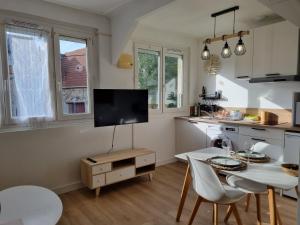 Appartements Studio parking jardin Netflix clim : photos des chambres