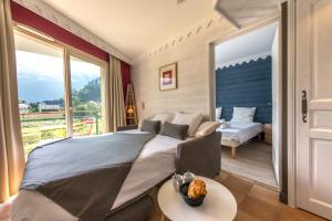 Appartements La Baie des Voiles, FEET IN THE CRYSTAL WATERS, 9 Apts from studio to Duplex by LLA SELECTIONS : photos des chambres