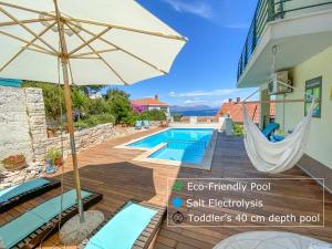 Two-Bedroom Apartment with Sofa Bed and Sea View room in Sunshine Apartments Lumbarda