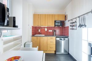 Appartements Le Cosy de Saint Cast - Vue Mer : photos des chambres