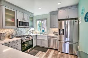 Waterfront Huntington Beach Condo with Fire Pit