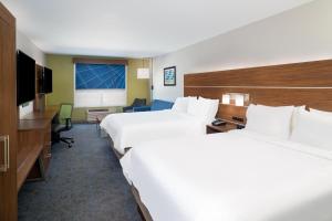Queen Suite with Two Queen Beds and Sofa Bed room in Holiday Inn Express and Suites Dahlonega University Area