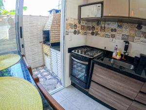 APARTAMENTO COM PISCINA E CHURRASQUEIRA