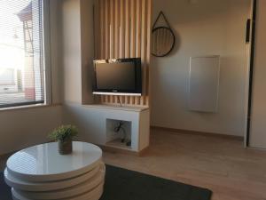 Appartements Le Chateau des Abeilles - appartement recemment renove - proche centre village et route des vins : photos des chambres
