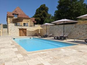 Maisons de vacances Gite de Fleurie - Tursac : photos des chambres