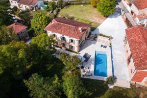 Maisons de vacances La Maison du Bonheur - Grande Piscine & Terrasse : photos des chambres