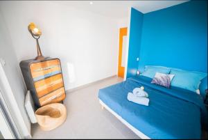 Appartements LE CALDERINI APPART - Face PLAGE WIFI et PARK Gratuit CALME - Resid Le Surcouf - CoHoteConciergerie La Grande Motte : photos des chambres