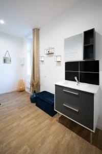 Appartements Ngsuitehome Winoc 34 : photos des chambres