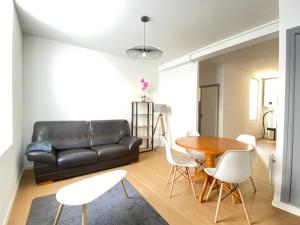 Appartements Le Sarcoui - Appartement tout confort proche de la Gare : photos des chambres