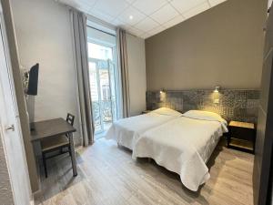 Hotels Hotel de La Comedie : photos des chambres