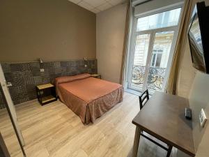 Hotels Hotel de La Comedie : photos des chambres