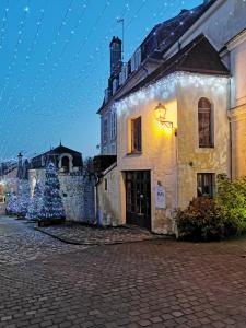 Appartements L'Ilot du Perche: Appartement cosy avec jardin : photos des chambres