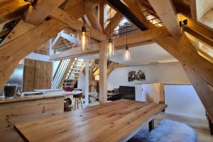 Appartements Les Suites du Monetier, alliant le charme et l'authenticite d'un chalet de prestige au coeur du village : photos des chambres