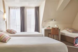 Hotels Campanile Lyon Centre - Berges du Rhone : Chambre Triple Supérieure (2 Adultes + 1 Enfant) - Non remboursable